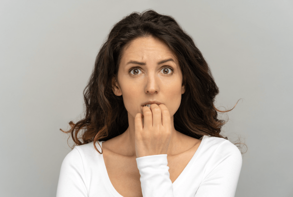 woman looking panicked