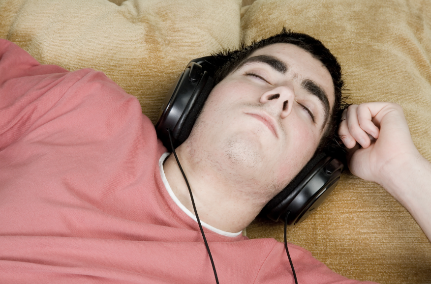 Teenager sleeping on the couch